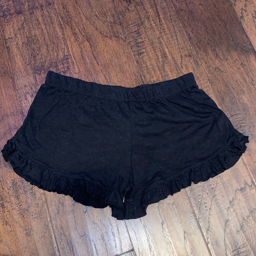 Black ruffled shorts